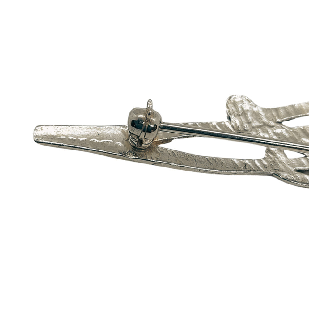 detail of the back of the long triangular celtic brooch, a sterling silver safety catch is fitted