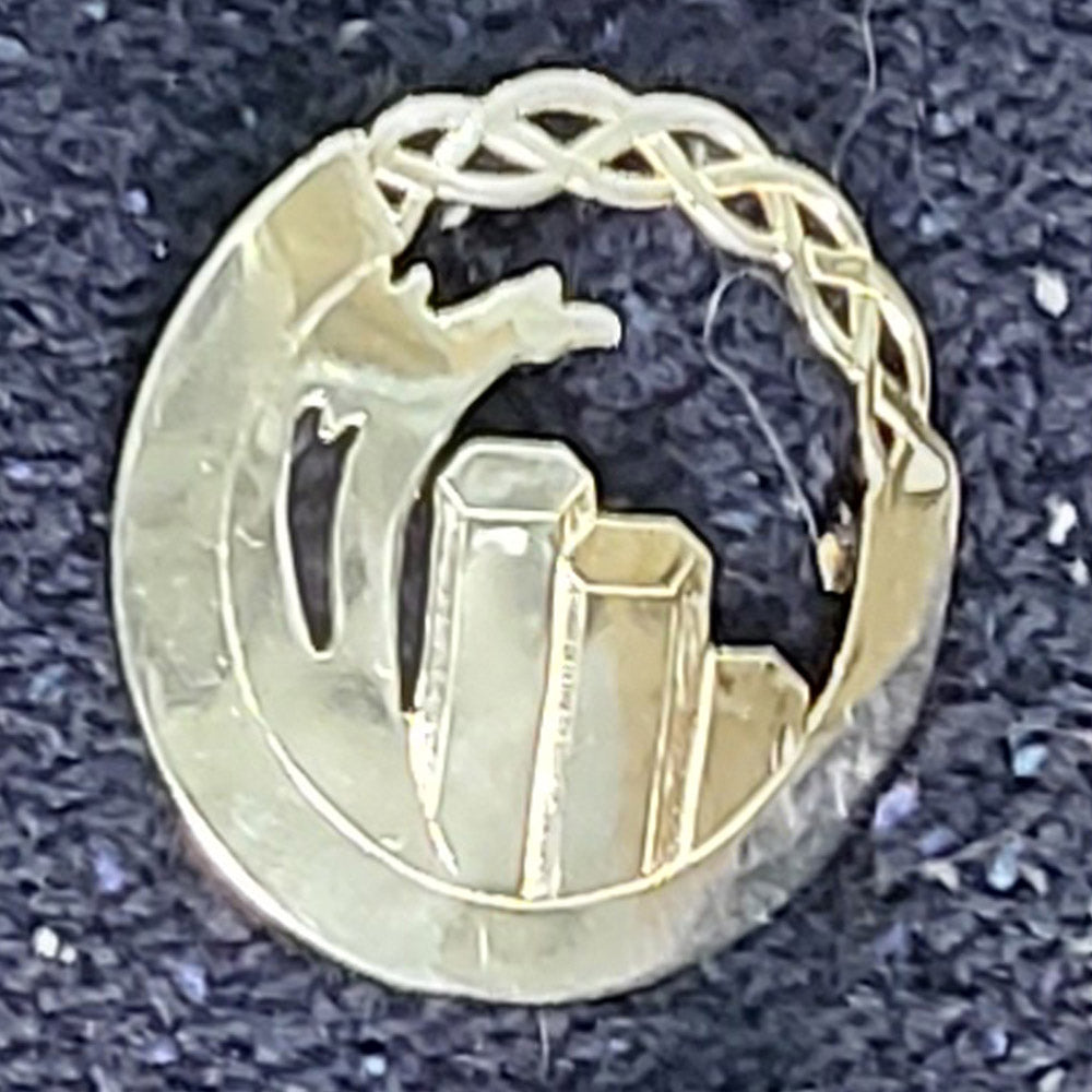 Sterling Silver Celtic Brooch: Wave over the Giant's Causeway Stones by Robert Spotten