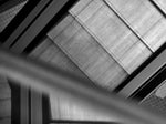 Detail of step texture in black and white Escher inspired picture of escalators in Victoria Square Belfast